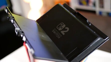 It comes with two caddies, one for Switch and one for Switch 2. It's easy to insert your console, and the caddy drops into the central unit with little effort, too